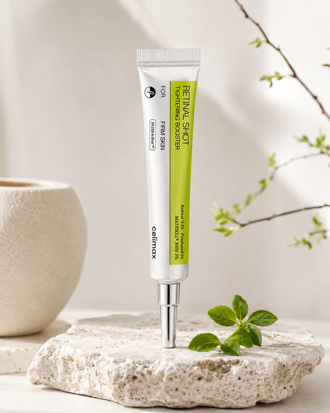 Retinal shot by celimax, skincare serum tube on a stone surface with a natural background